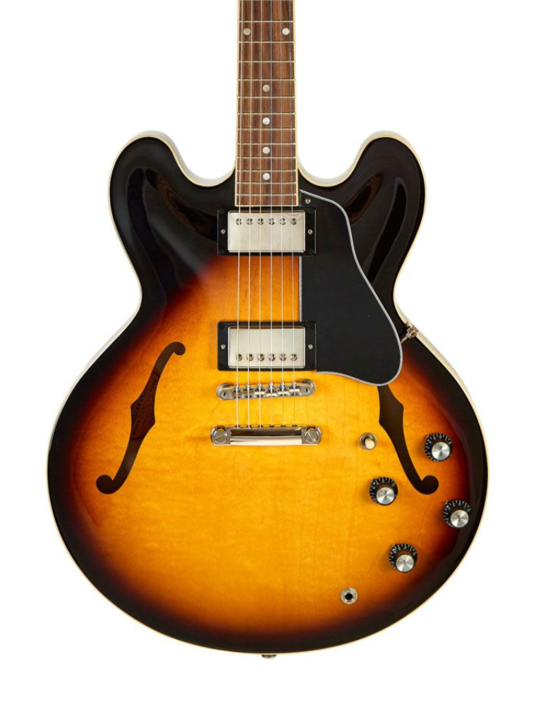 Sunburst semi-hollow electric guitar with two humbucker pickups, four control knobs, pickguard, and f-shaped sound holes on a rounded body.