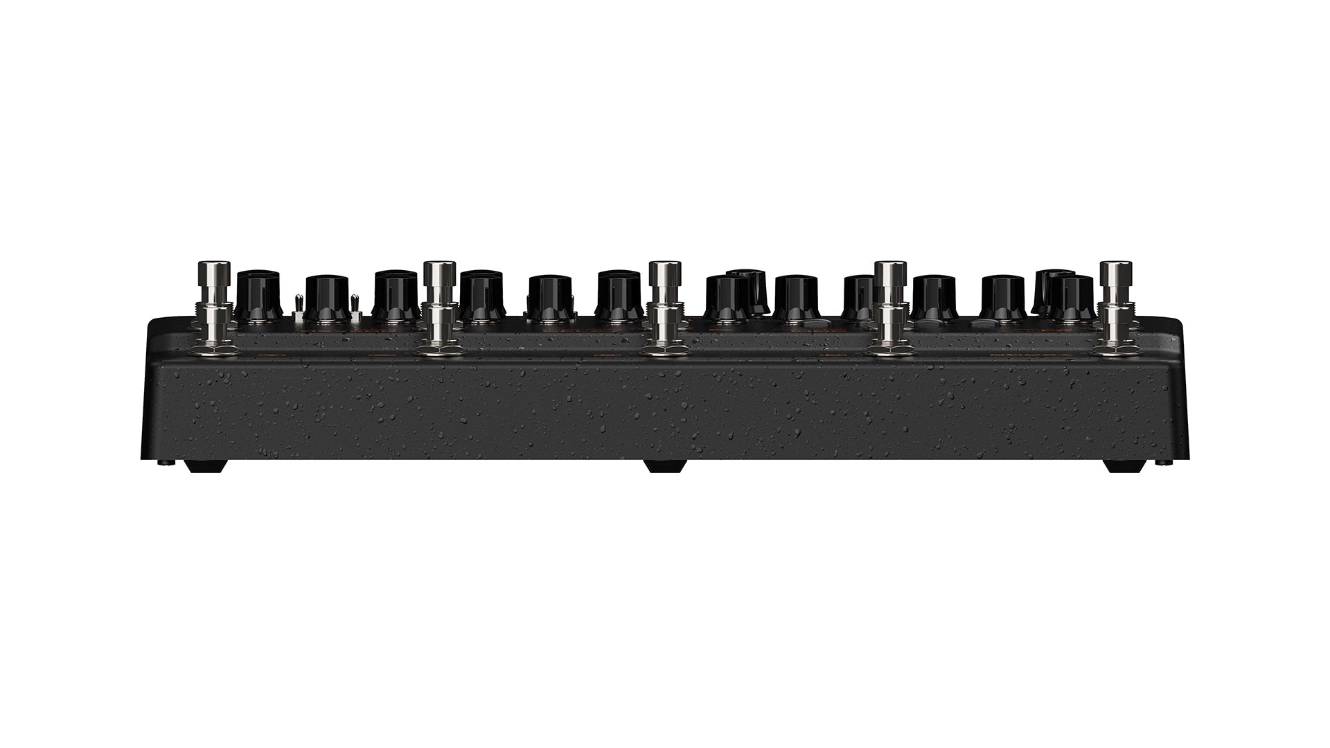 Guitar FX pedal with a row of footswitches and black control knobs on a rectangular, black, water-speckled surface.