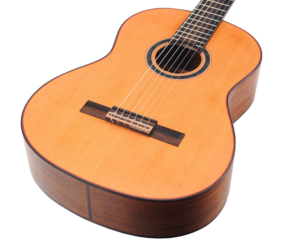 Classical guitar with a light brown wooden top, dark wood sides, six nylon strings, round sound hole, and a flat, wide fingerboard.