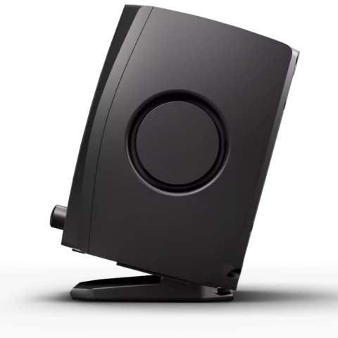 Black, rectangular recording studio monitor speaker shown from the side, featuring a circular speaker cone and a small knob near the bottom.