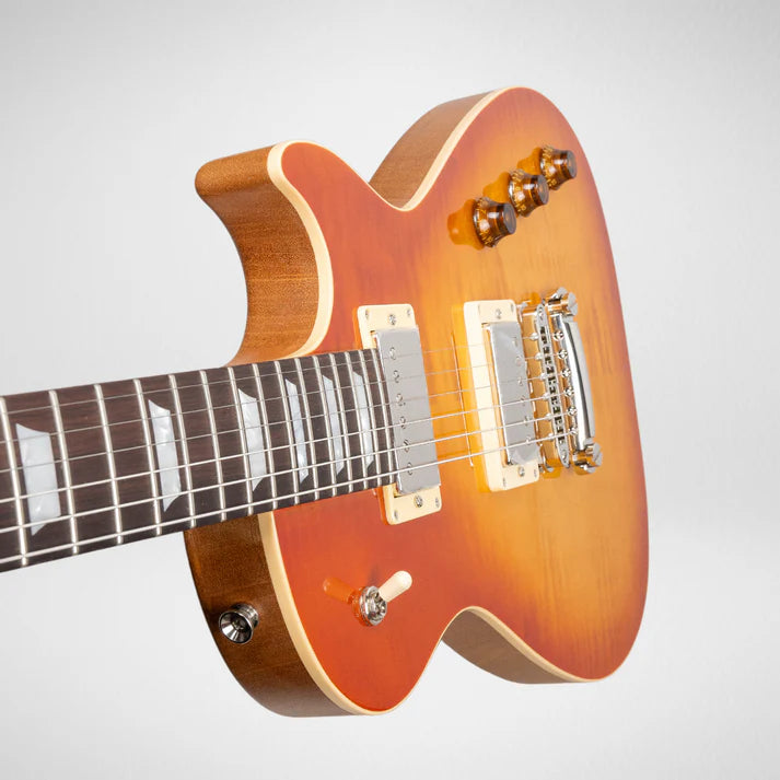 Glossy sunburst electric guitar with a carved top, two humbucker pickups, four amber control knobs, and a toggle switch near the lower cutaway.