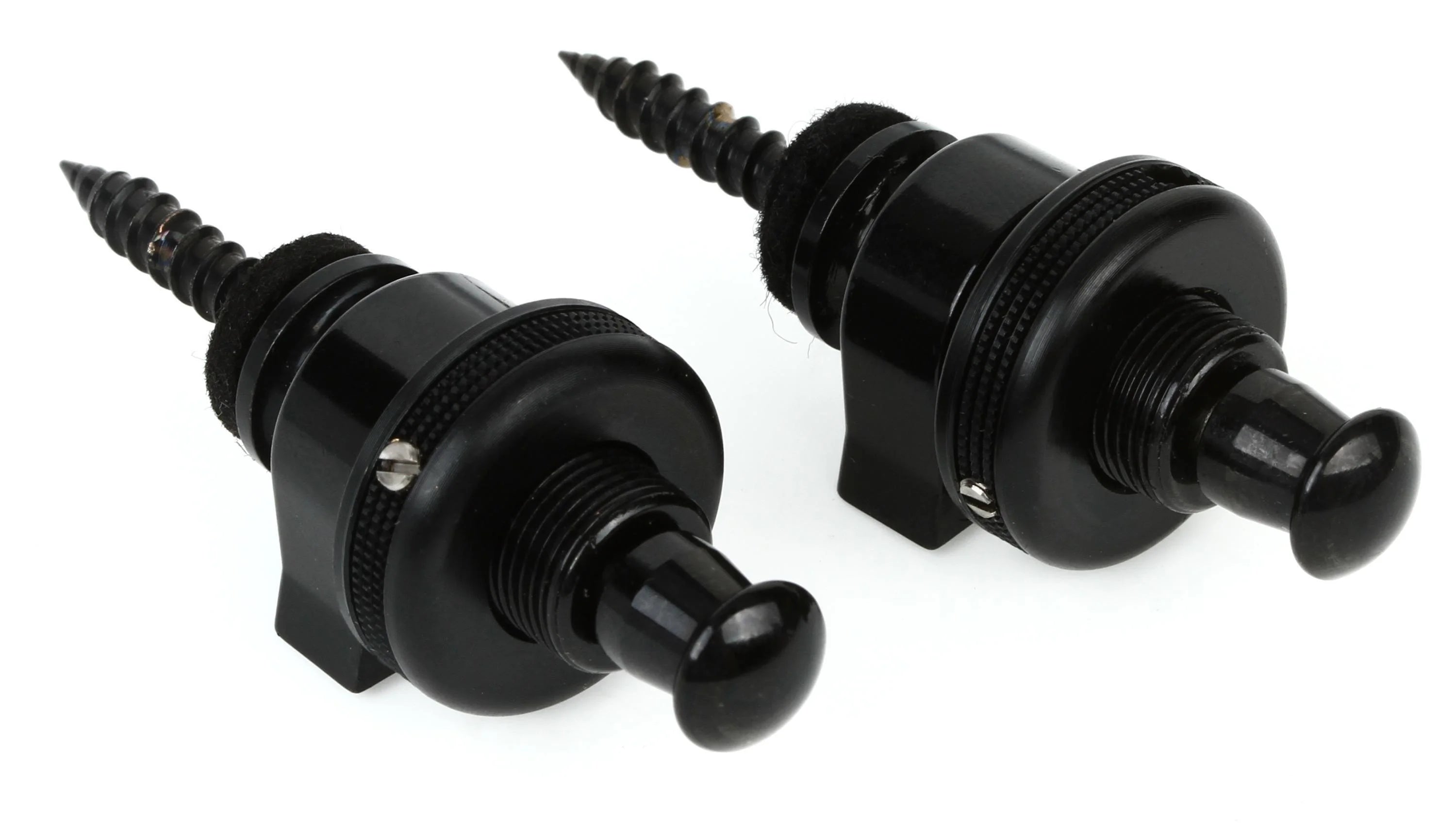 Two black guitar strap locks with round buttons and screw ends, used to securely attach a guitar strap to the instrument.