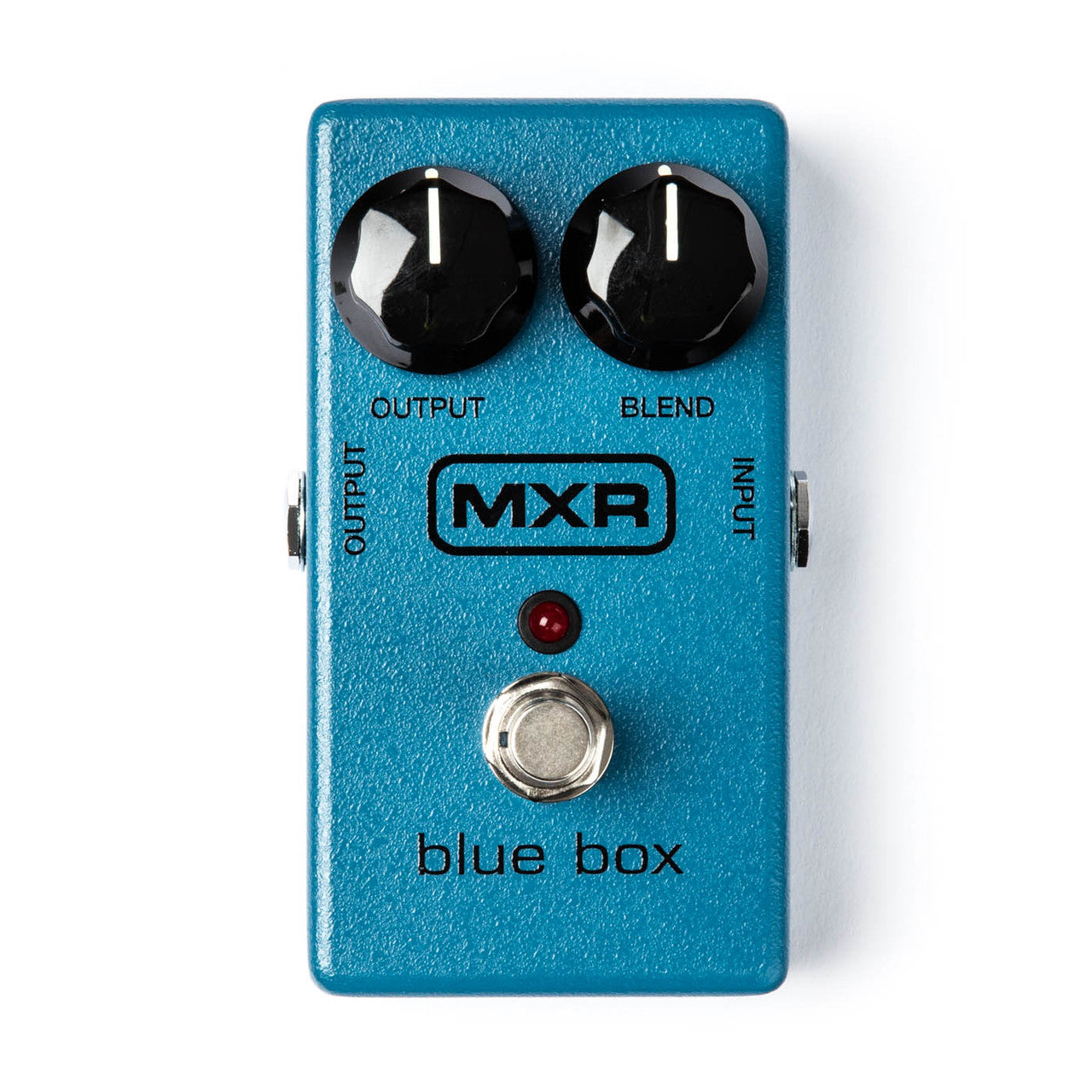 Blue MXR Blue Box FX pedal with two black knobs labeled Output and Blend, a footswitch, and a red LED indicator in the center.