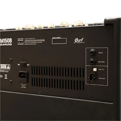 Rear panel of a Cort KM150B amplifier showing power switch, ventilation slots, send/return ports, ground lift, and line out connections.