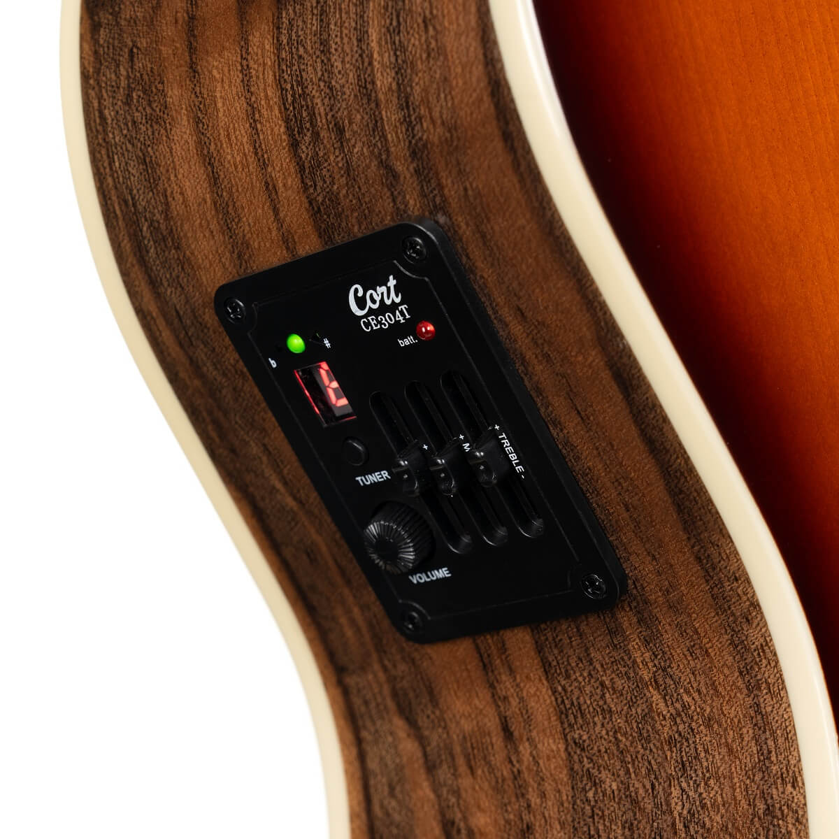 Built-in control panel on an acoustic guitar’s side, featuring a tuner, volume knob, EQ sliders, and labeled “Cort CE304T.”