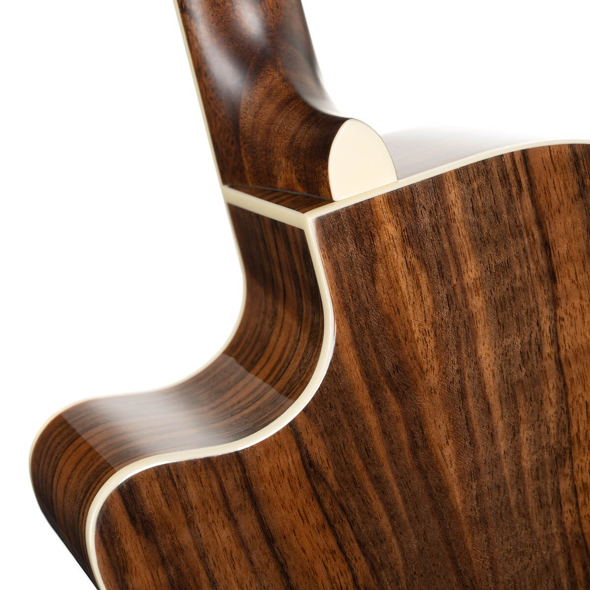 Close-up of an acoustic guitar’s neck joint, showing glossy dark wood grain with cream binding along the edges.