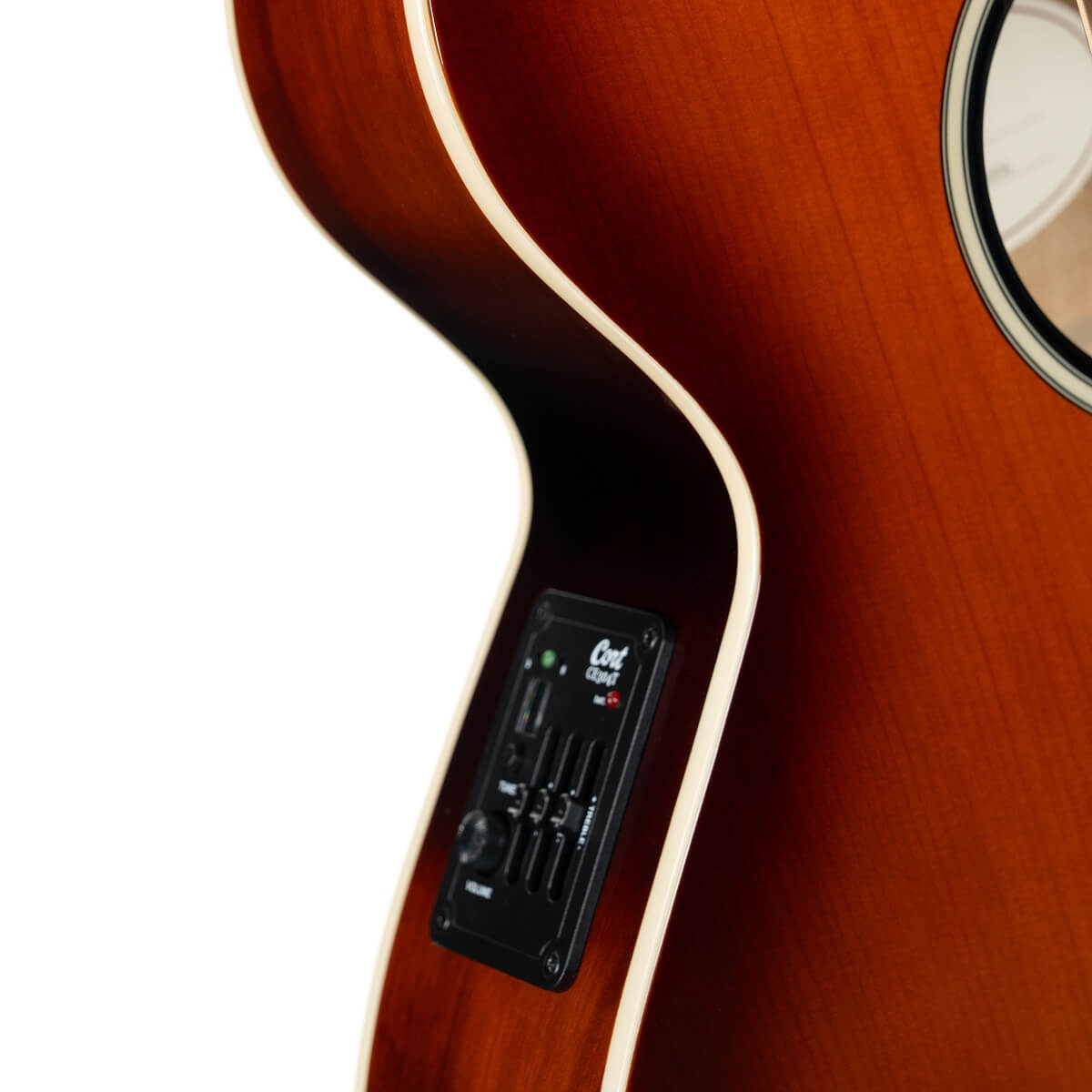 Brown acoustic guitar with a built-in electronic control panel and equalizer on its side, next to the soundhole.