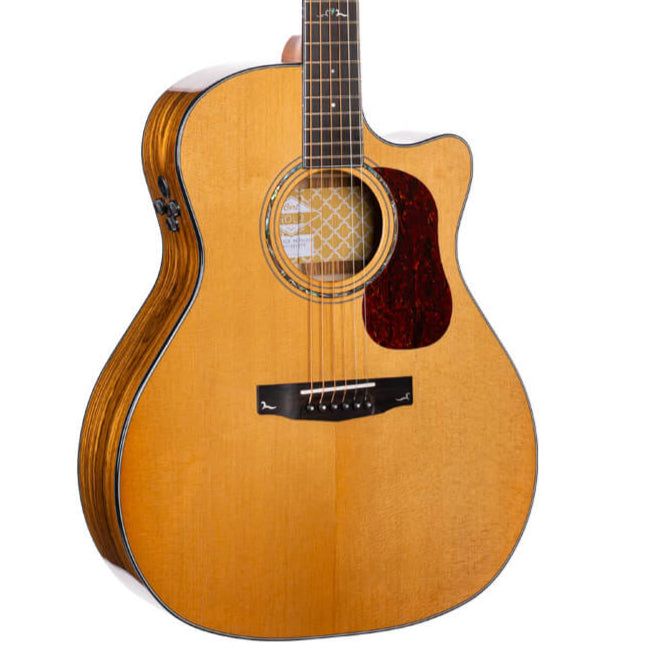 Natural wood acoustic guitar with a cutaway body, six strings, dark pickguard, and decorative round sound hole rosette.