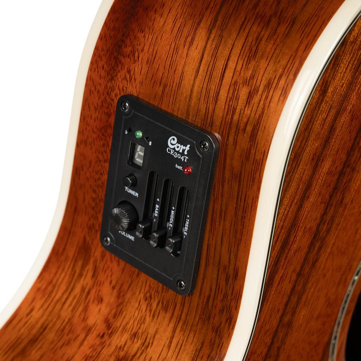 Cort acoustic guitar showing a built-in CE304T preamp with tuner, volume knob, and sliders for bass, middle, and treble on a brown wood body.