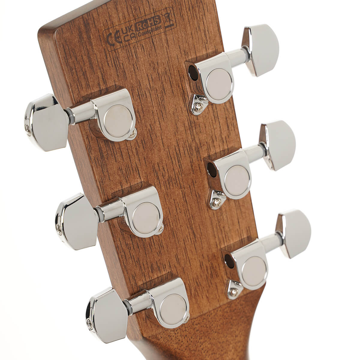 Six chrome tuning pegs mounted on the back of a wooden acoustic guitar headstock, arranged with three on each side.