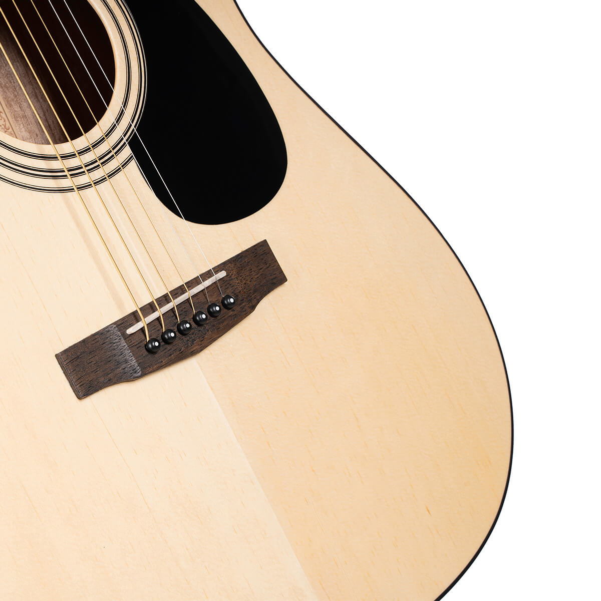 Light wood acoustic guitar body with black pickguard, six steel strings, dark wood bridge, and black bridge pins.