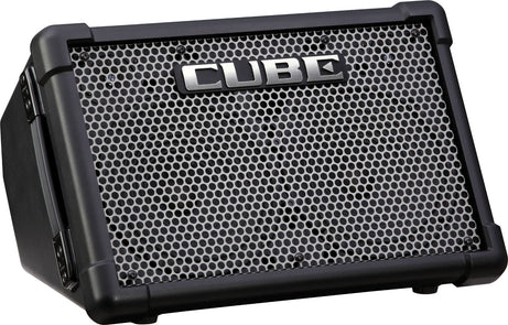 Black Cube amplifier angled upward, with a large silver 