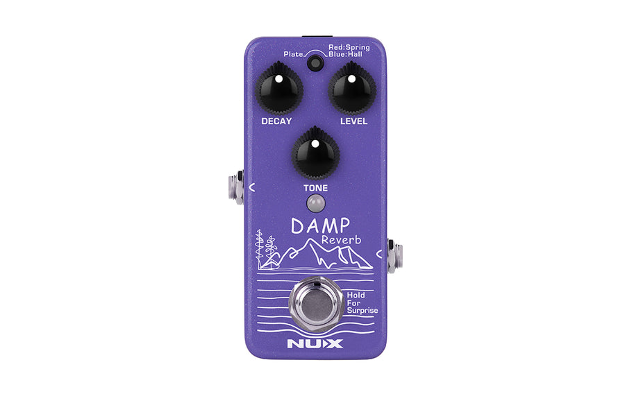Purple NUX Damp Reverb FX pedal with three black knobs labeled Decay, Level, and Tone, plus white mountain and tree artwork on the front.