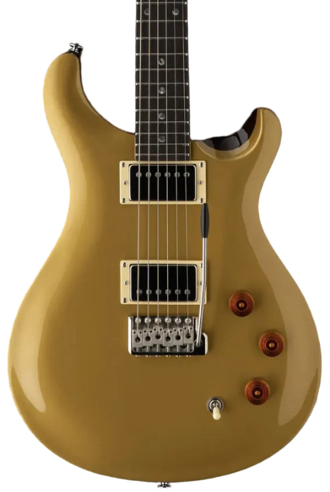 Metallic gold electric guitar with two black humbucker pickups, three amber control knobs, a three-way switch, and a silver tremolo bridge.