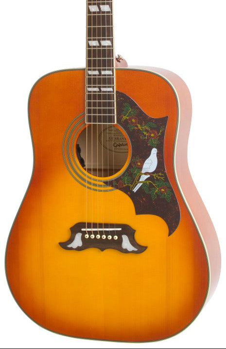 Sunburst acoustic guitar with decorative pickguard featuring a white dove and floral design, and a unique mustache-shaped bridge.