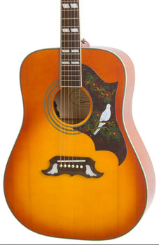 Sunburst acoustic guitar with decorative pickguard featuring a white dove and floral design, and a unique mustache-shaped bridge.