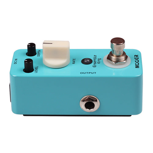 Light blue effects pedal with three knobs labeled Level, Depth, Rate, a footswitch, and an output jack on the front panel.