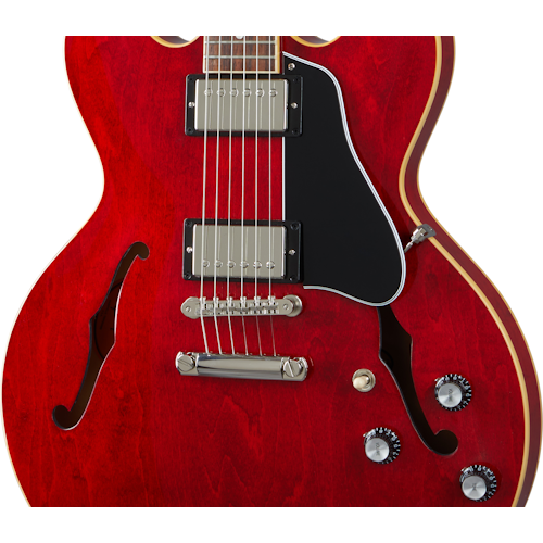 Red semi-hollow electric guitar body with two humbucker pickups, four control knobs, a black pickguard, and two f-shaped sound holes.