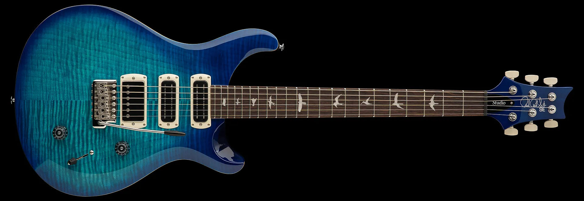 Blue electric guitar with a flamed maple top, three pickups, two knobs, a whammy bar, and bird-shaped inlays on a dark fretboard.