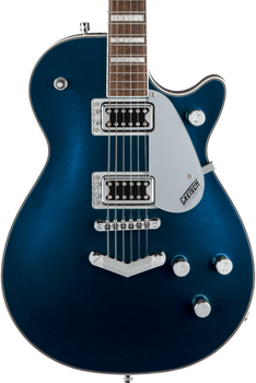 Metallic blue electric guitar with two chrome-covered pickups, silver pickguard, three control knobs, and a V-shaped tailpiece.
