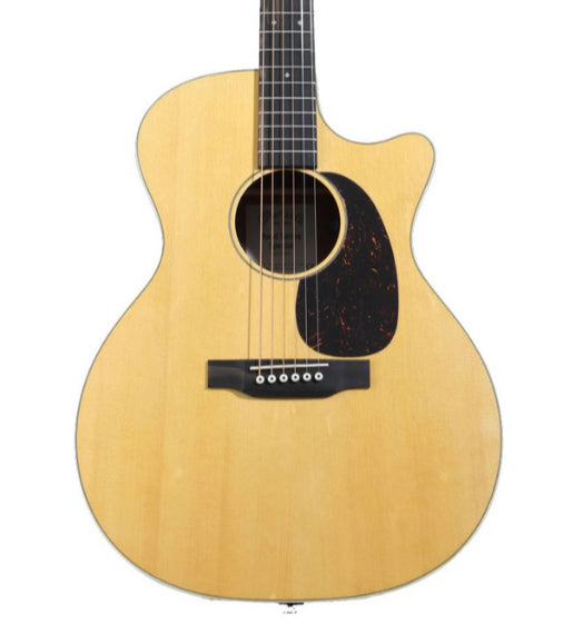 Natural wood acoustic guitar with a single cutaway, black pickguard, six strings, and a round sound hole.