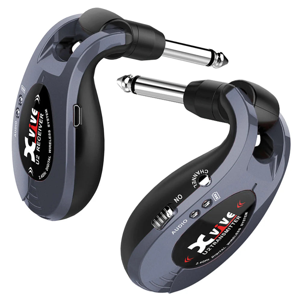 Two compact Xvive U2 wireless transmitters with 1/4-inch plugs, labeled “receiver” and “transmitter,” feature buttons, switches, and LED indicators.