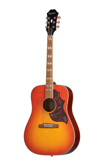 Sunburst acoustic guitar with a reddish-orange body, decorative pickguard, six strings, and pearl inlays on the wooden fretboard.