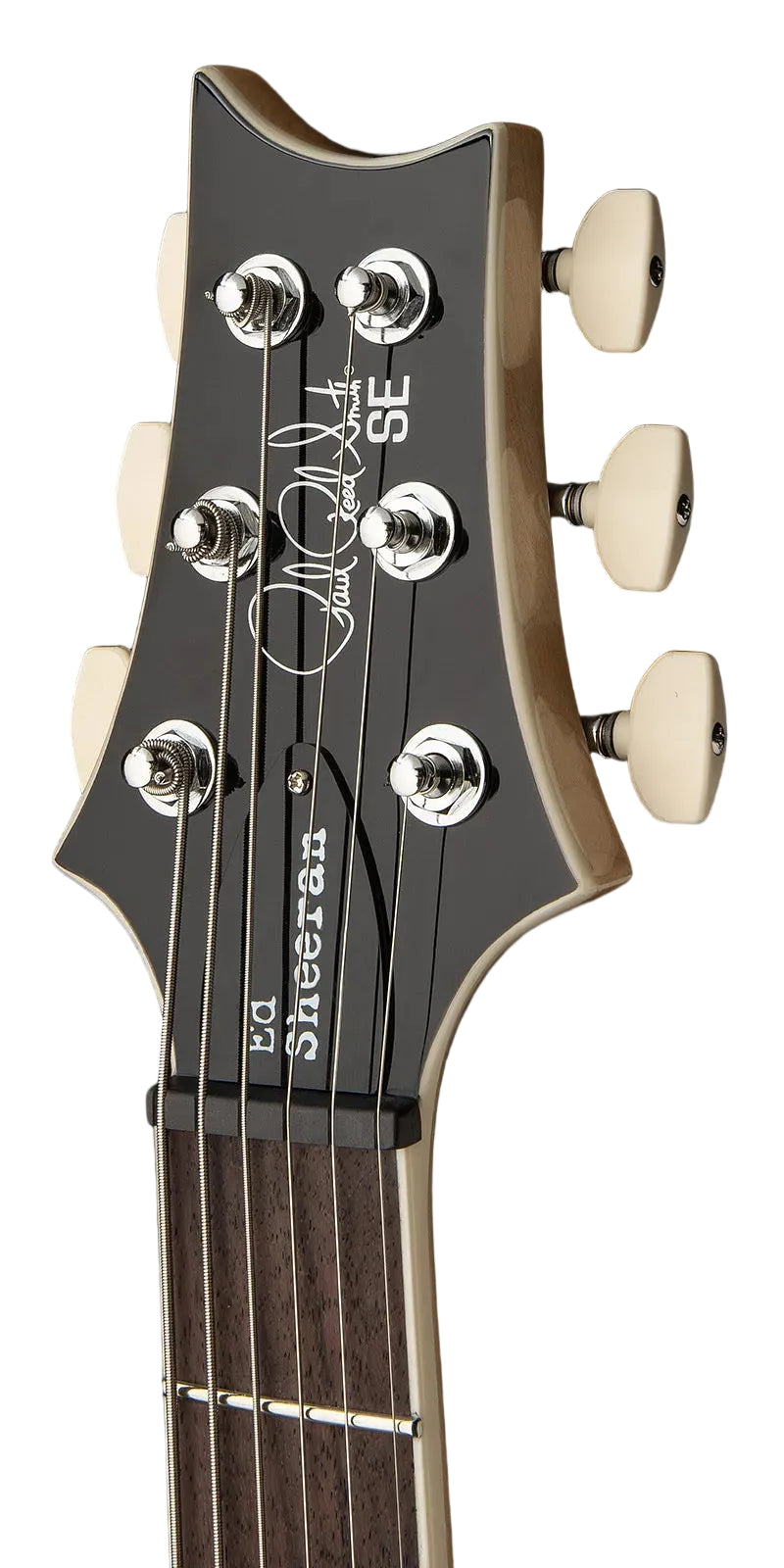 Close-up of a Paul Reed Smith SE guitar headstock with six tuning pegs, black faceplate, white logo, and dark wood fretboard.