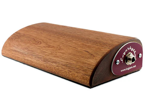 Rectangular wooden hand held percussion instrument with a curved top and an input jack on one end for amplifier connection.
