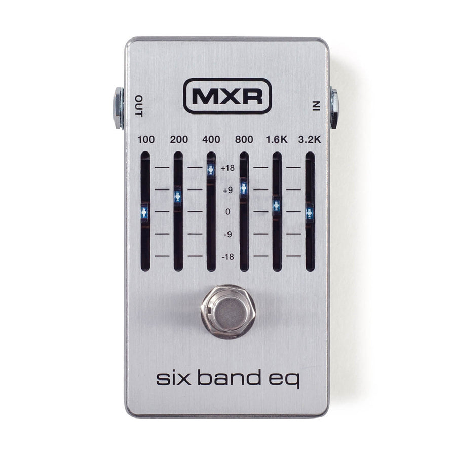 Silver MXR six band EQ effects pedal with six vertical sliders labeled by frequency, a central footswitch, and "six band eq" text at the bottom.