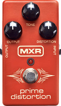 Red MXR Prime Distortion effects pedal with three knobs labeled Tone, Output, and Distortion, plus a central footswitch and input/output jacks.