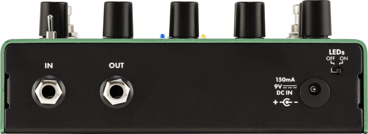 Green effects pedal rear panel with IN and OUT jacks, LED switch, 9V DC power input, and four black control knobs on top.
