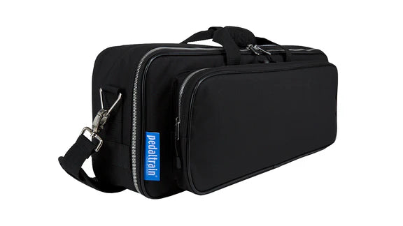 Rectangular black Pedaltrain soft case with two zippered compartments, shoulder strap, and carry handles.
