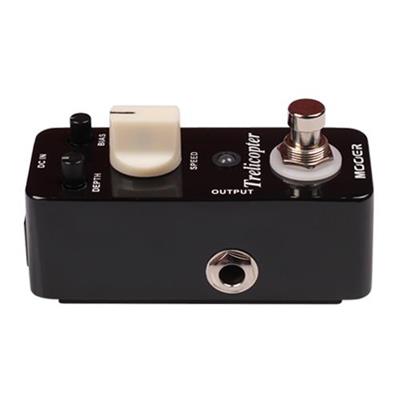 Black effects pedal with a large white speed knob, two small black knobs labeled depth and bias, a footswitch, and labeled output jack.