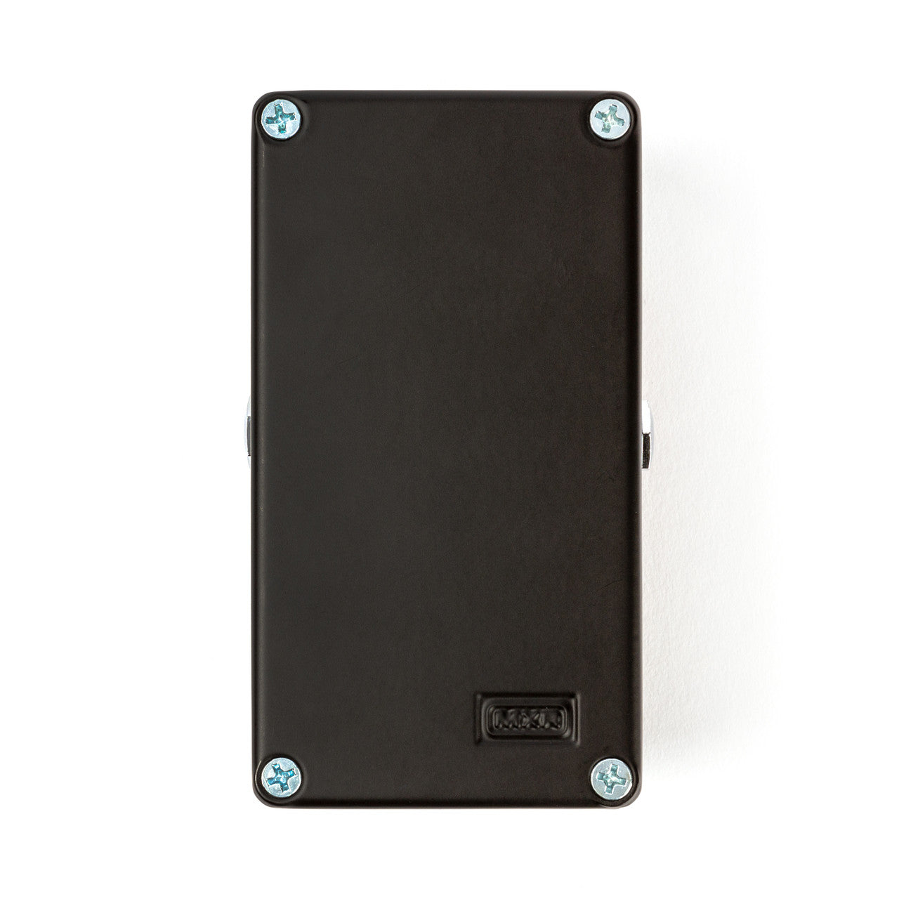 Black FX pedal rectangular case with four screws at the corners and a small embossed label near one edge, no visible buttons or knobs.