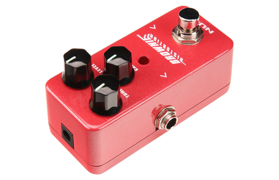 Red FX pedal with three black control knobs, a footswitch, input and output jacks, and white labeling indicating “BROWNING” and control names.
