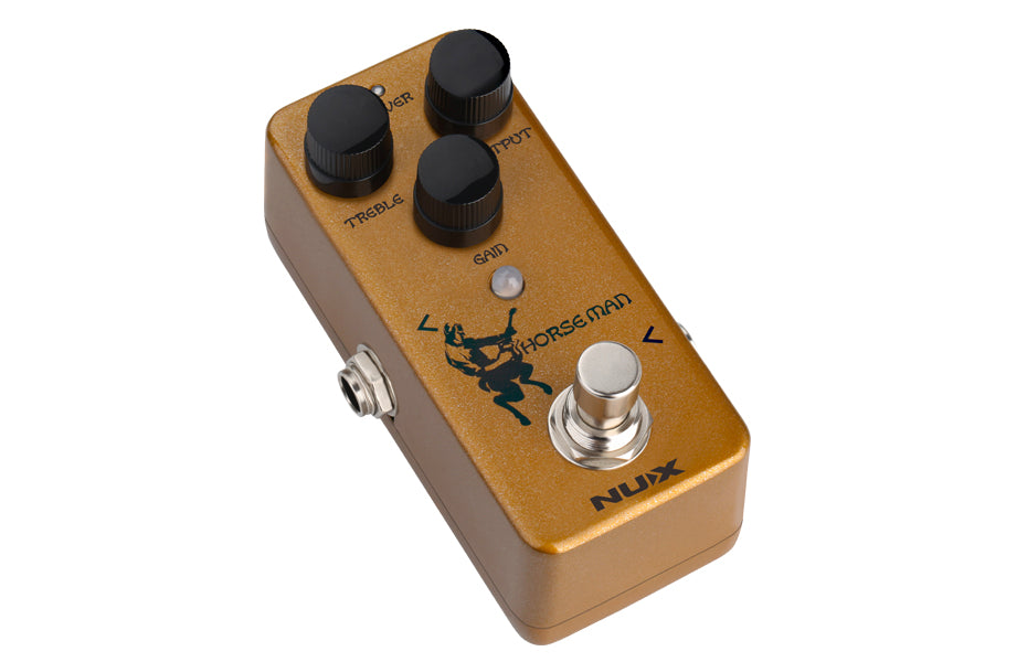 Gold FX pedal with three black knobs labeled treble, output, and gain, a footswitch, a silhouette of a horseman, and "NUX" branding.