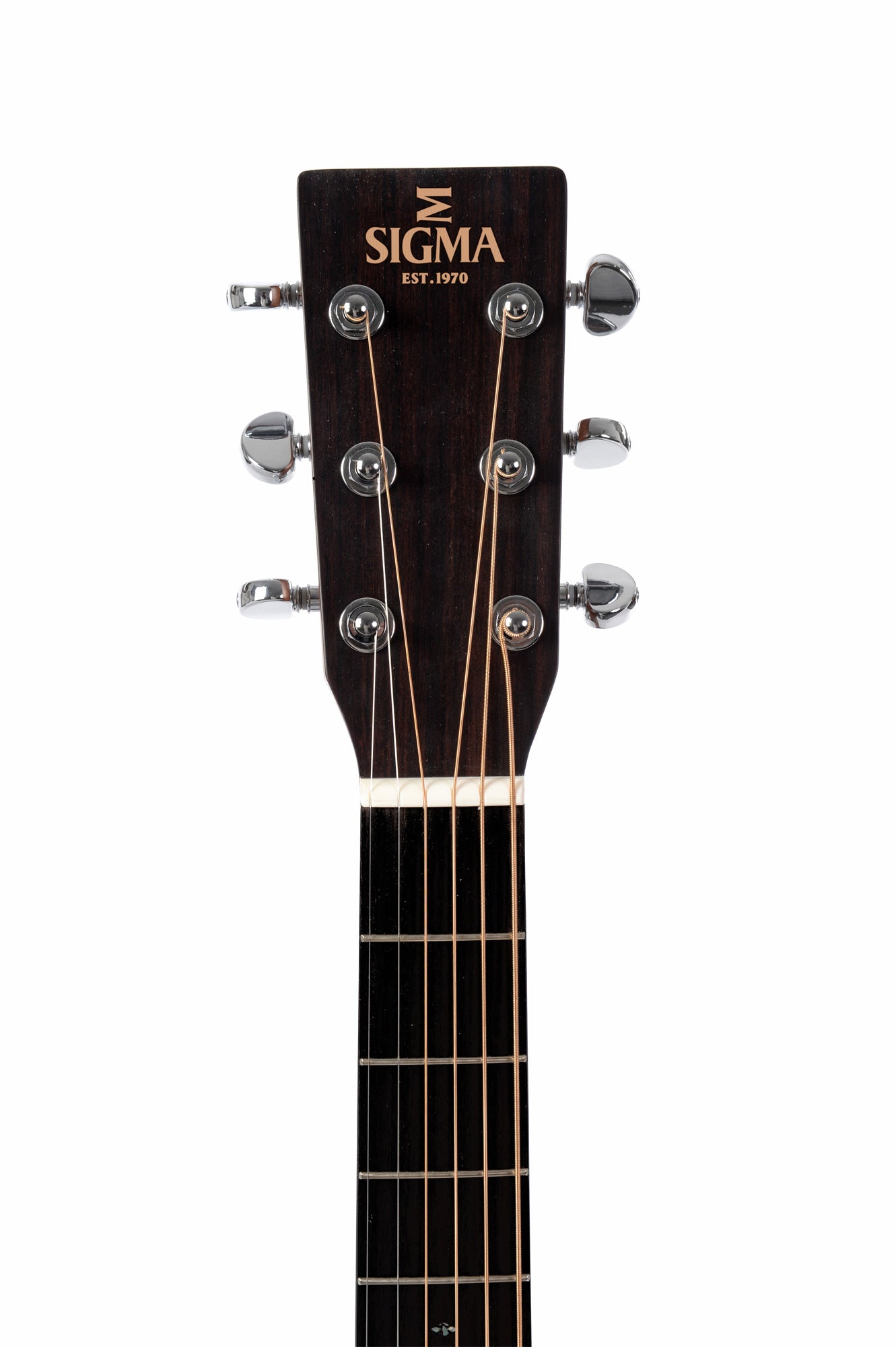 The dark wood headstock of a Sigma acoustic guitar with six silver tuning pegs and the Sigma logo and "EST. 1970" in gold at the top.