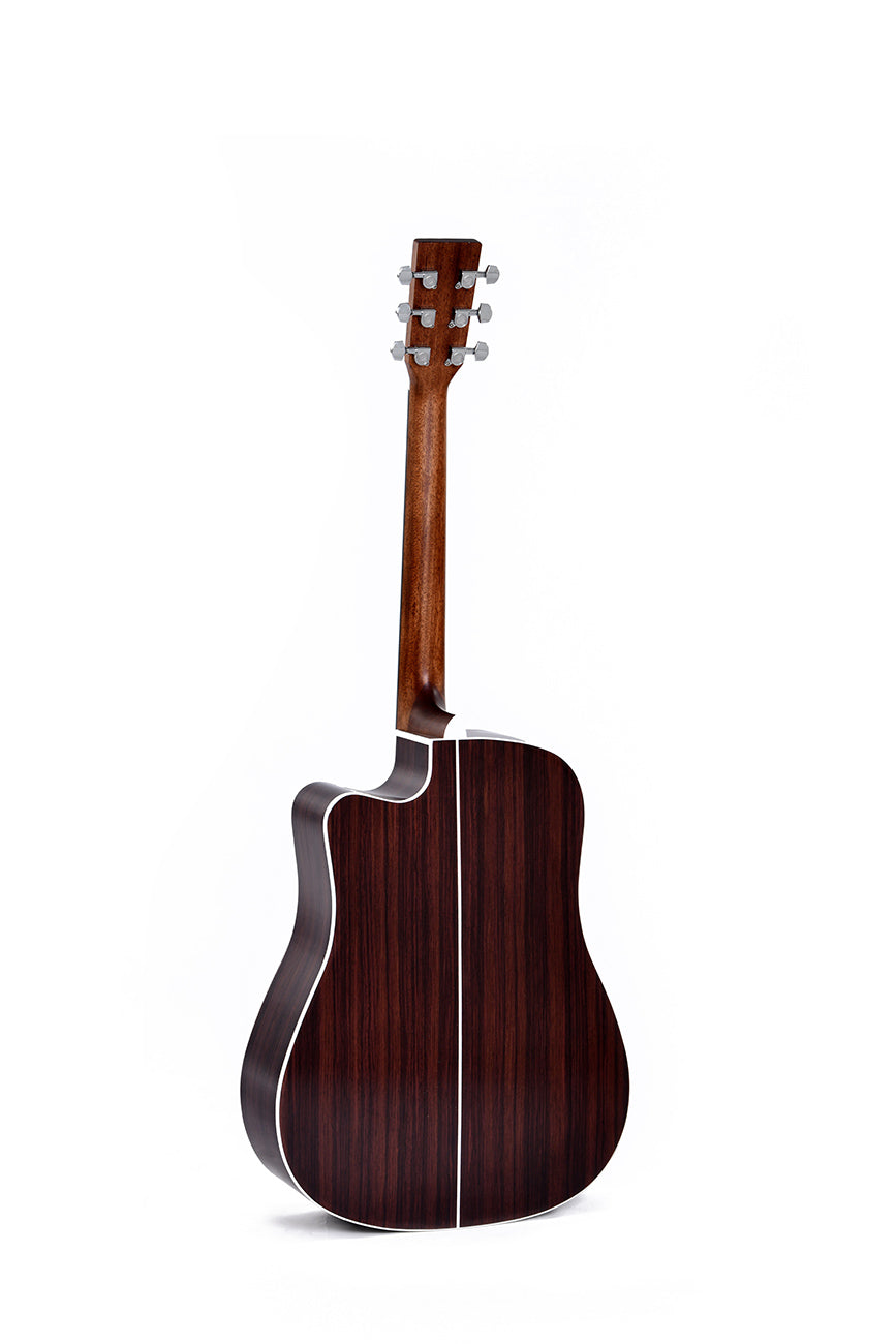 Acoustic guitar viewed from the back, dark wood body with white edges and center stripe, mahogany neck, silver tuning pegs, single cutaway design.