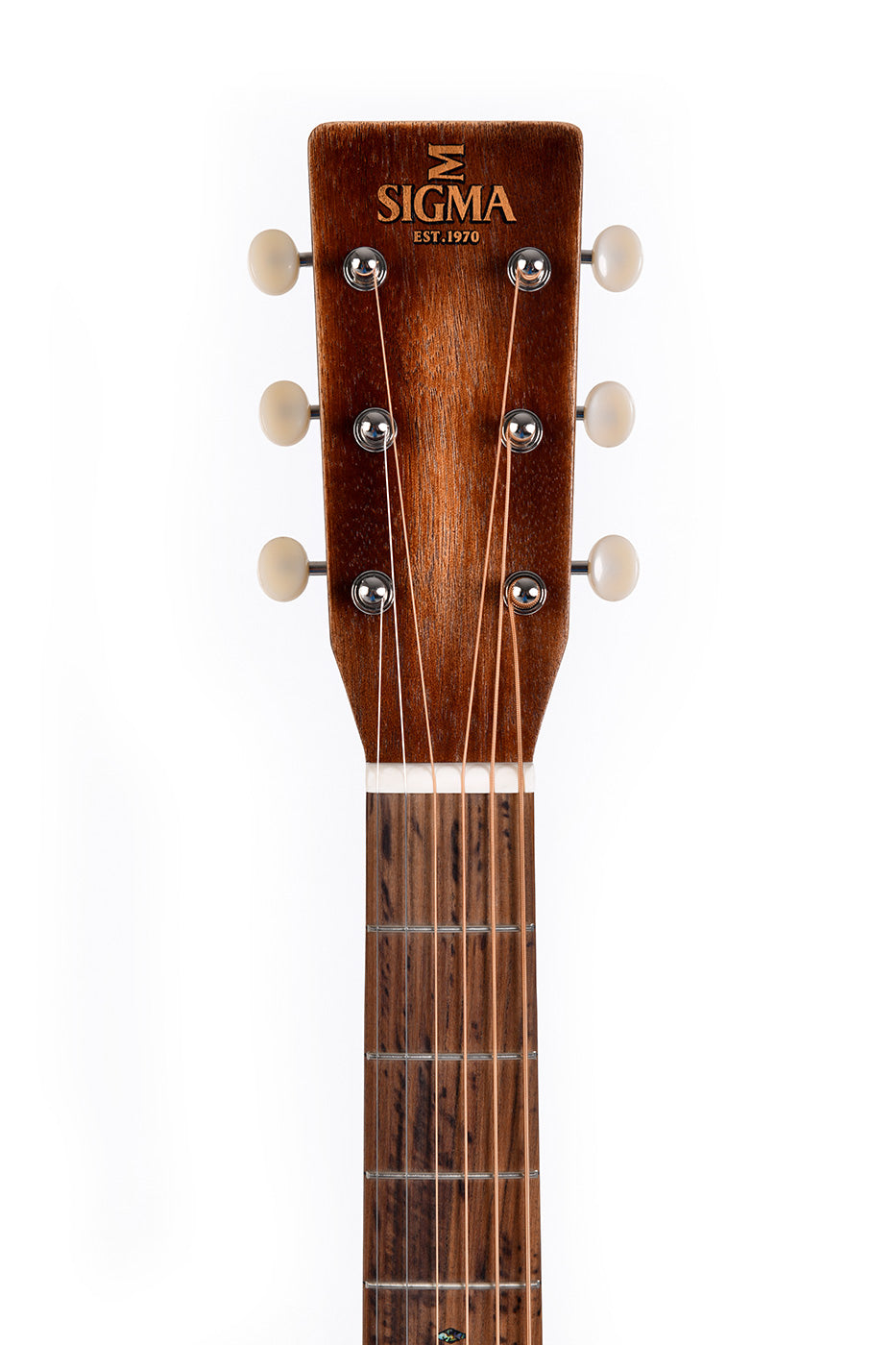 Six-string Sigma acoustic guitar headstock with white tuning pegs, wood finish, and "SIGMA EST. 1970" logo in gold letters on top.