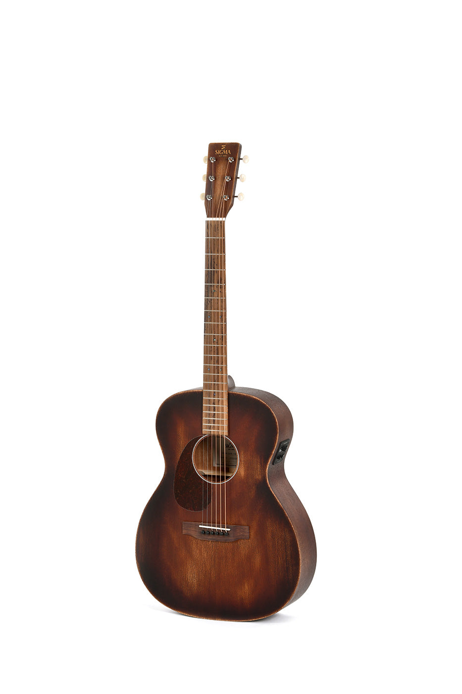 Sigma acoustic guitar with a matte sunburst finish, rounded body, six steel strings, and white tuning pegs on the headstock.
