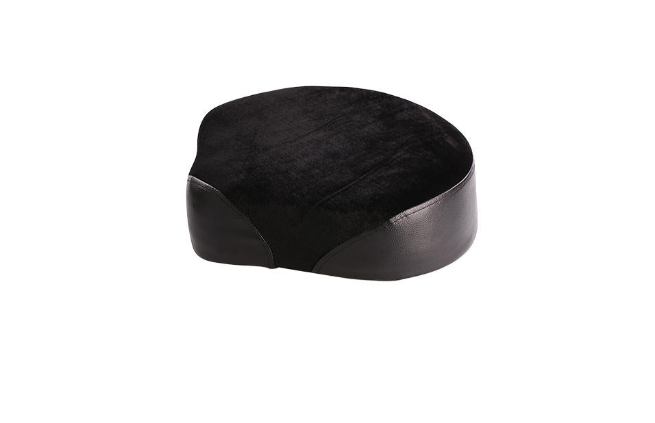 Round black padded drum seat cushion with a soft, fuzzy top and smooth sides, designed for comfortable drumming.