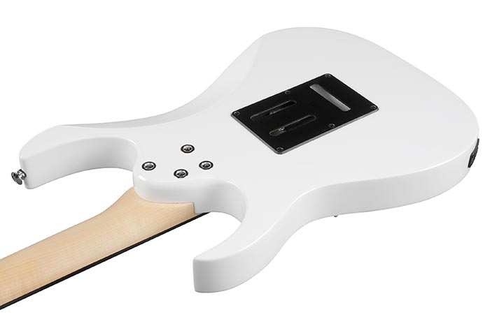 White electric guitar shown from the back, with a light wood neck and a black rectangular cover plate near the center of the body.
