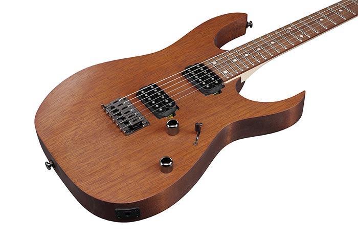 Brown solid-body electric guitar with two black humbucker pickups, two control knobs, and a fixed bridge.