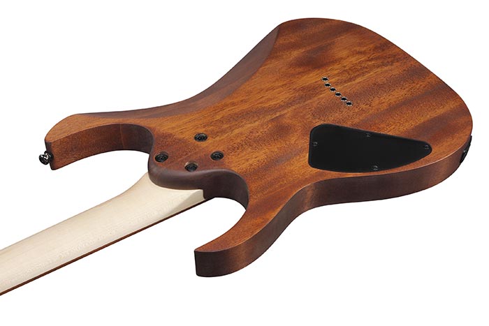 Electric guitar with a natural wood finish showing the back, including a black triangular electronics cover and a light-colored neck attachment.
