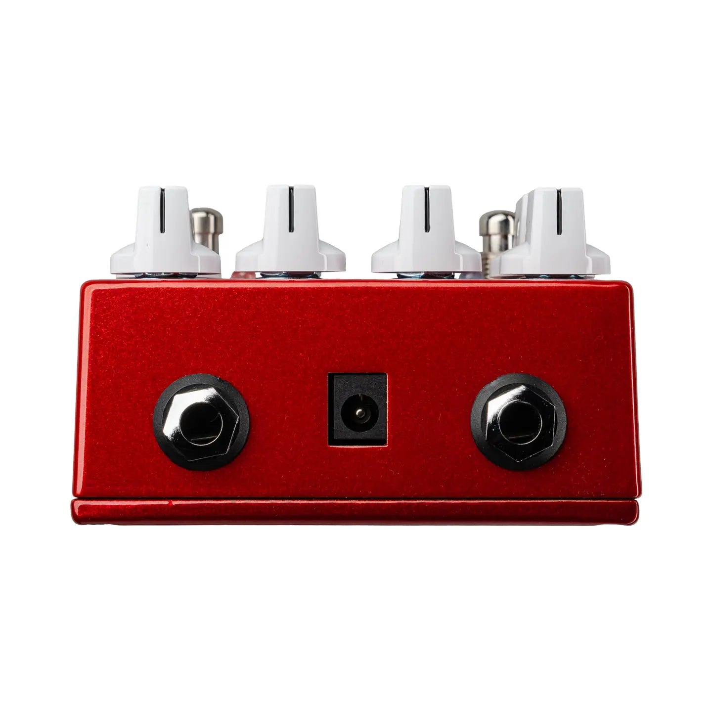 Red FX pedal with two input/output jacks, a center power socket, and four white control knobs on top.