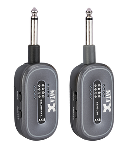 Two compact Xvive wireless transmitters with 1/4 inch plugs, labeled A58 Transmitter and A58 Receiver, each with indicator lights and buttons.
