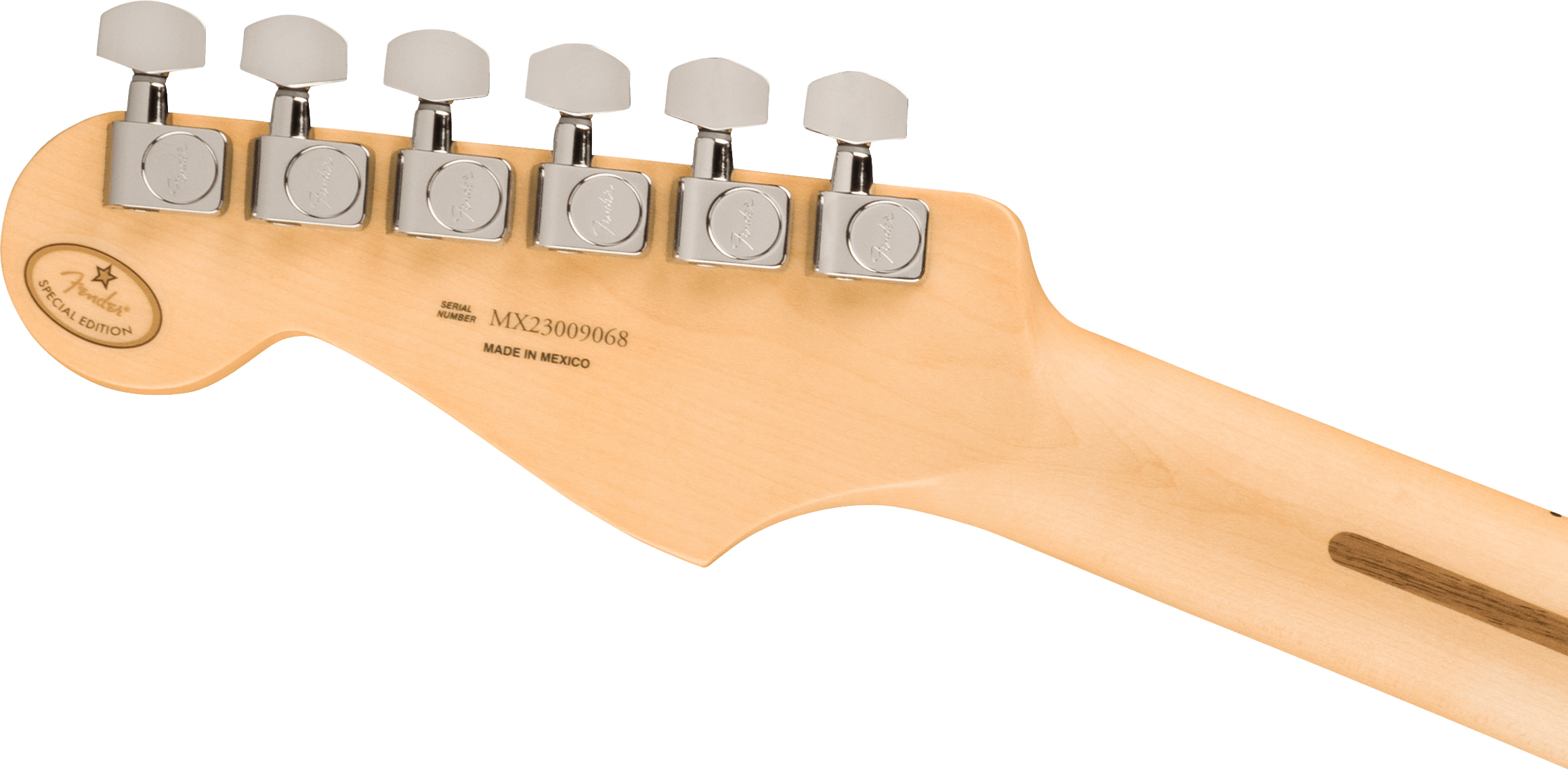 Back of a Fender electric guitar headstock with six chrome tuners, “Special Edition” badge, and “Made in Mexico” and serial number printed on wood.