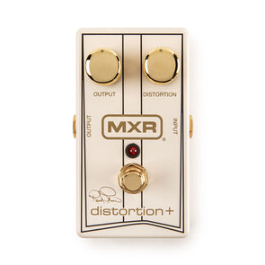 Cream-colored MXR distortion effects pedal with two gold knobs labeled Output and Distortion, a footswitch, and a red LED indicator.