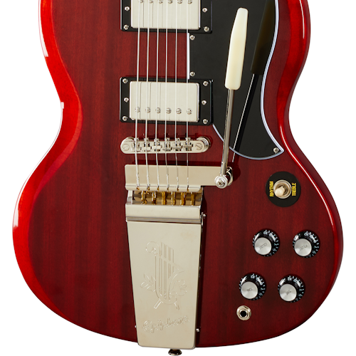 Red electric guitar body with chrome Bigsby vibrato, four black control knobs, a switch, dual humbucker pickups, and a black pickguard.